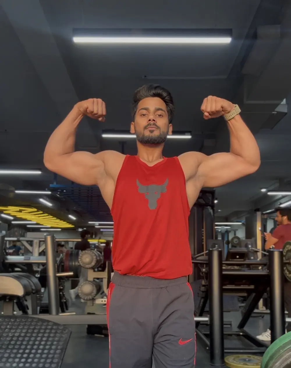 Coach Hamza standing in the gym